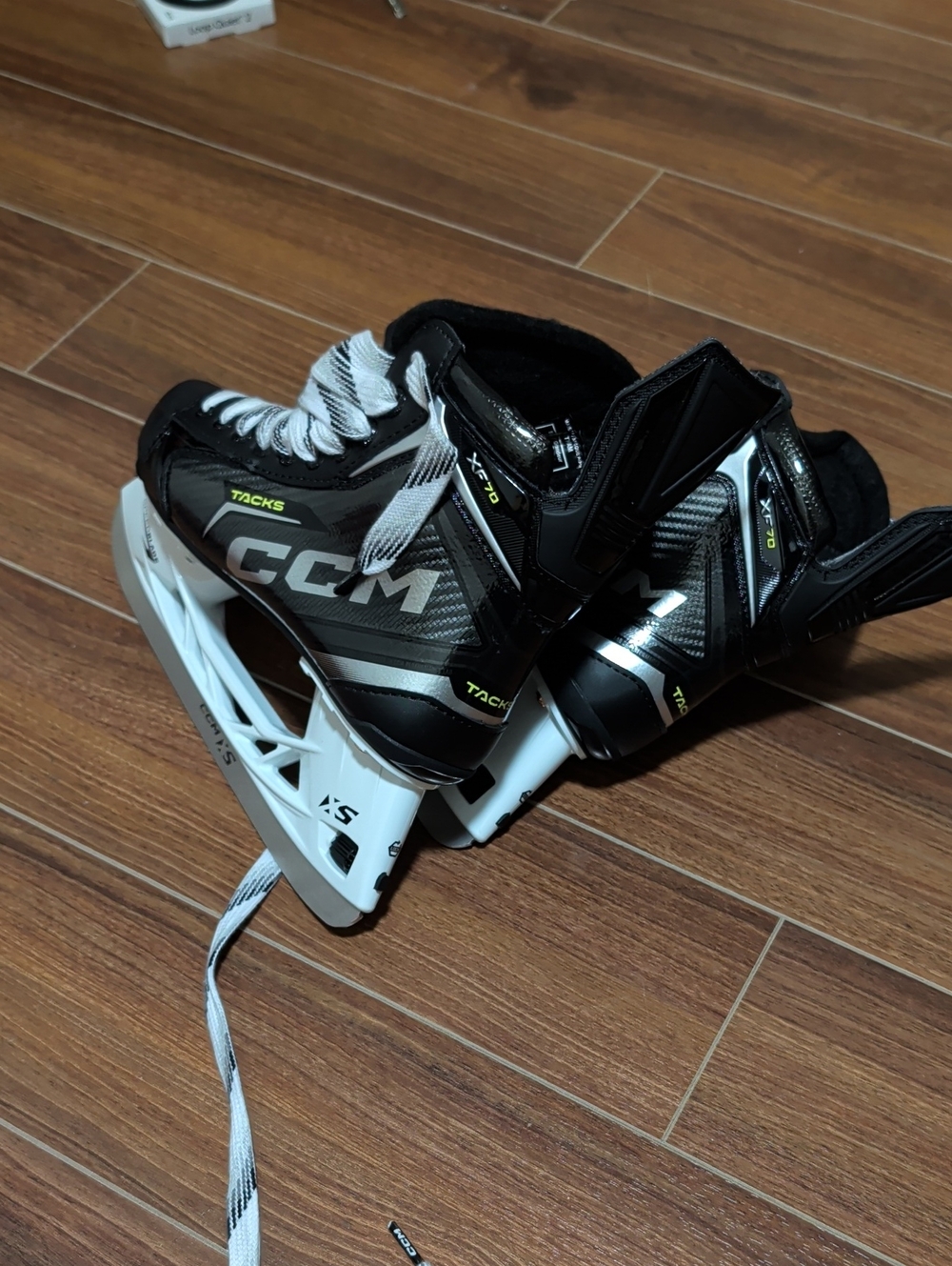 CCM Black and White Men's Iceskate with Lime Accents